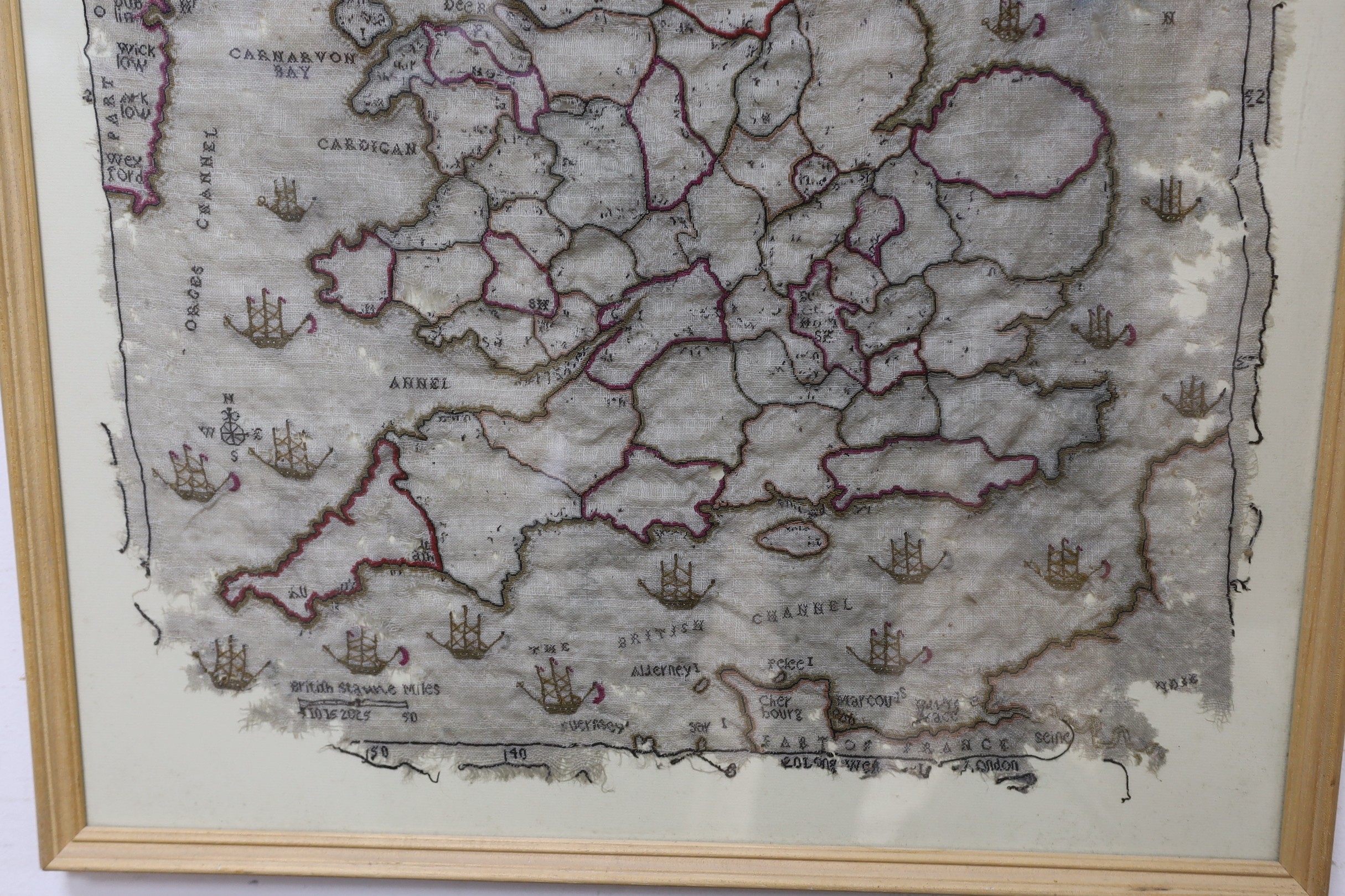 A framed early 19th century map sampler of England and parts of Scotland and Wales. 55x49cm excl frame